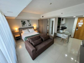 Flat Tropical Executive - vista praia, rio e cidade